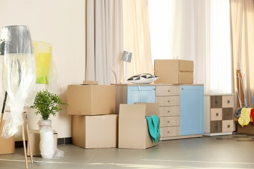 Removal team handling furniture safely during a Streatham move