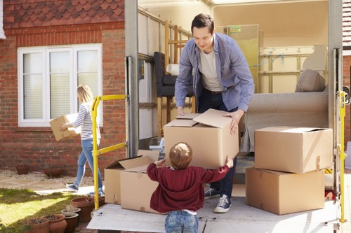 Removal van and moving boxes for a Streatham property move