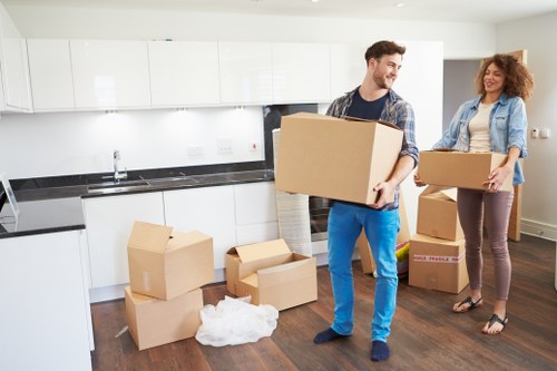Removal team loading furniture during house removals in Streatham