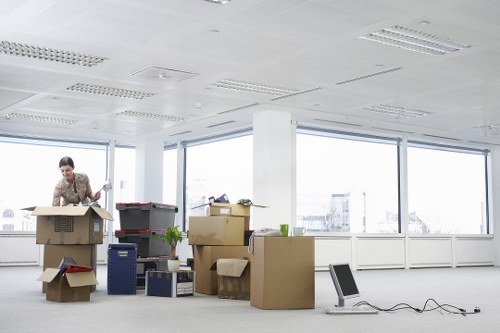 Careful wrapping of fragile household items during a packing service