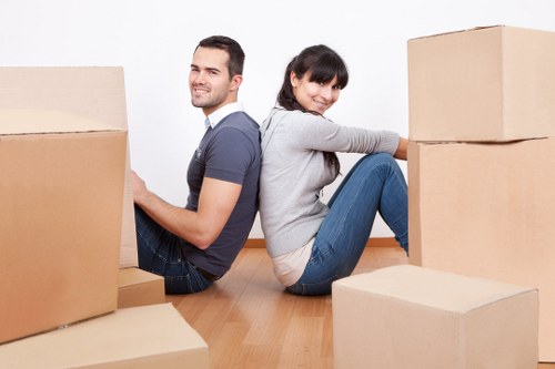 Professional removals staff working together to maintain safe practice